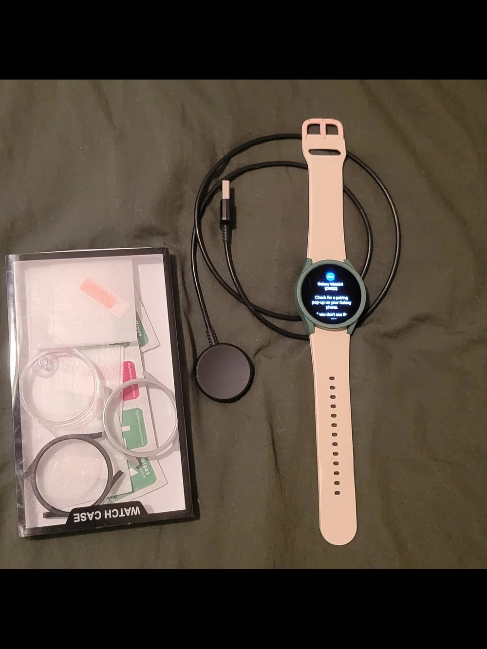 Samsung Galaxy Watch4 with Light Pink Silicone Band and Dark Green Case